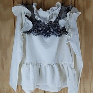 Ruffled black lace blouse